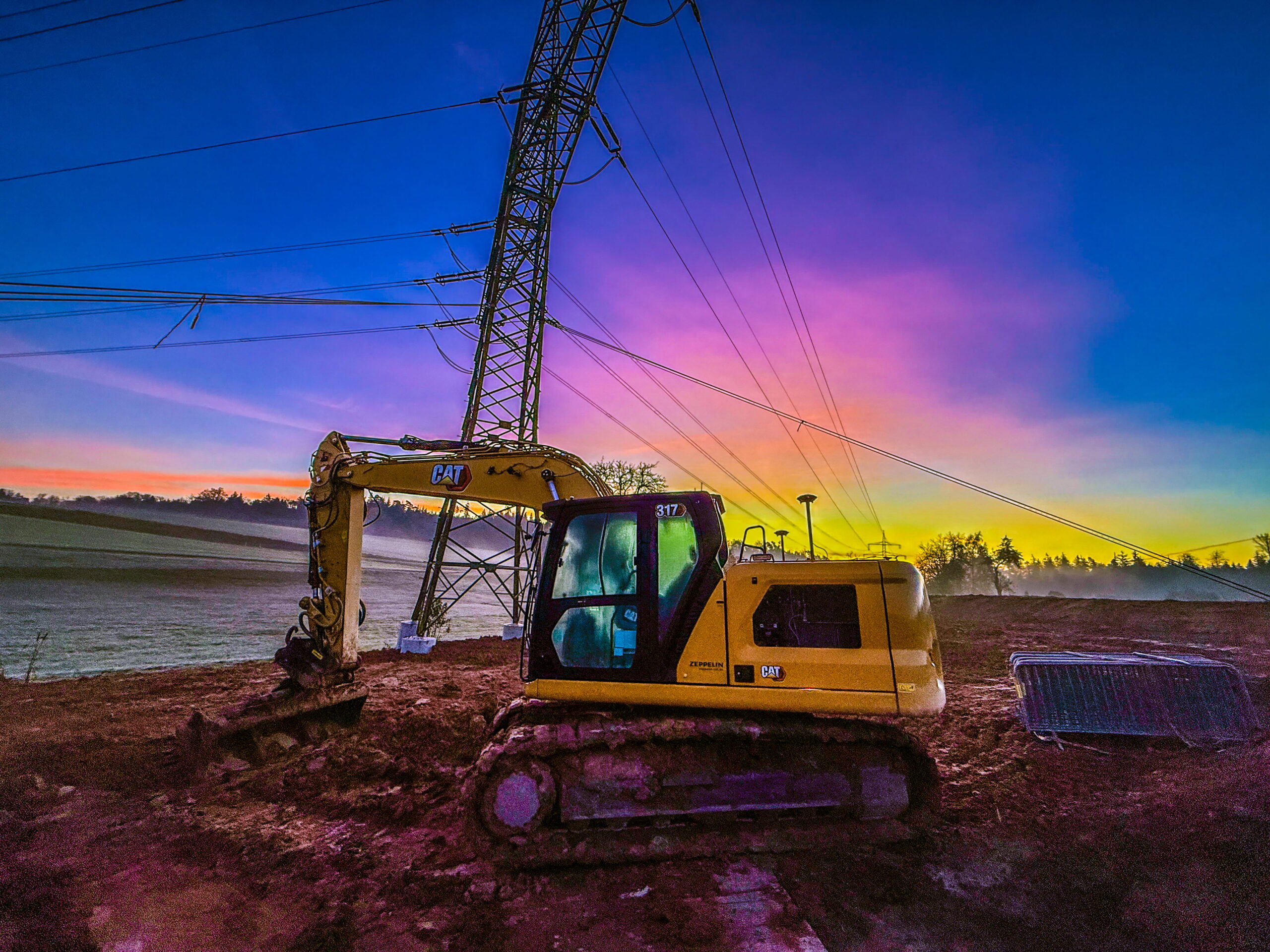 burgkhardt_erdbau_bagger_cat_sonnenuntergang